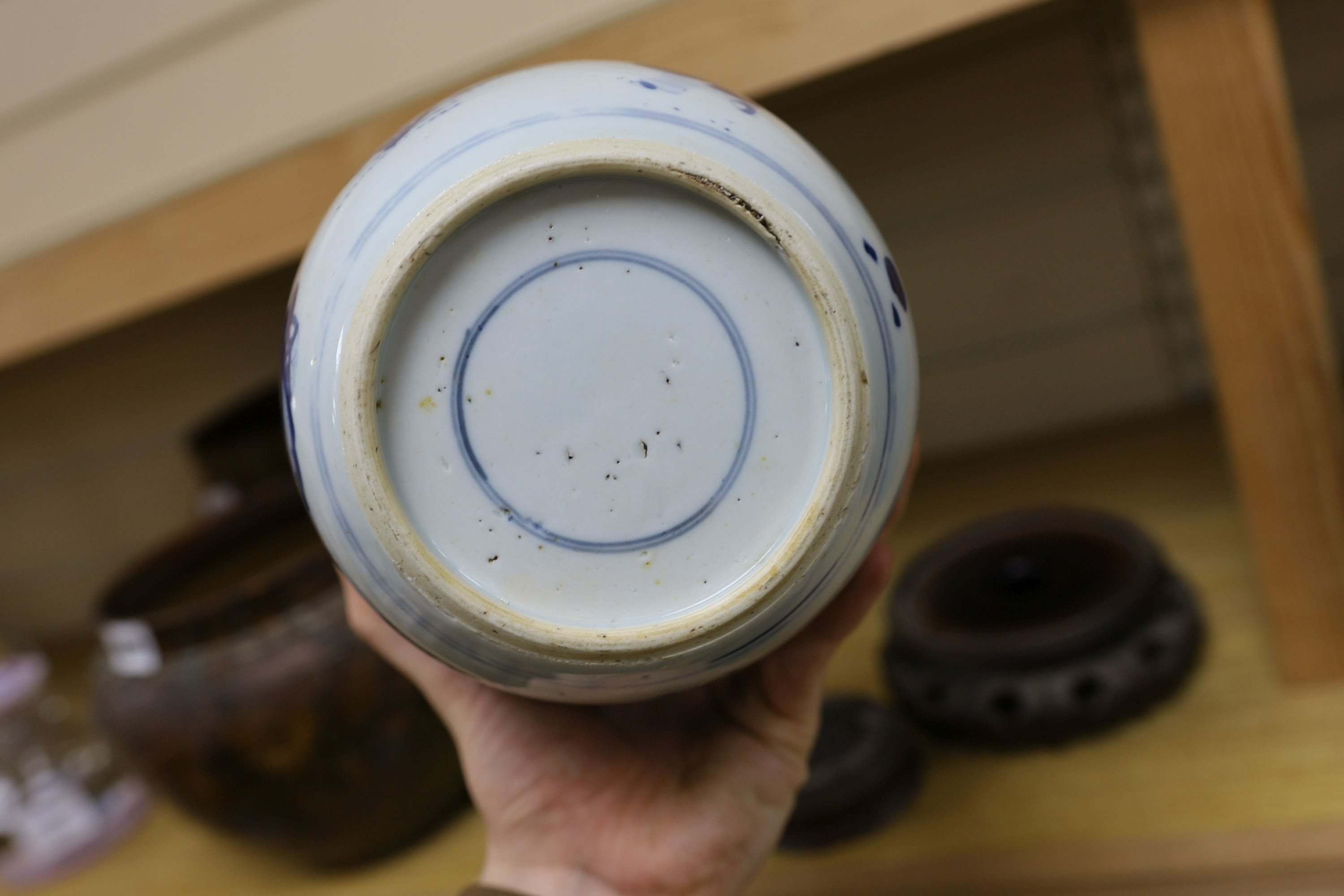 A Chinese blue and white 'boys' jar, 19th century, wood cover and stand, total height 24cm high